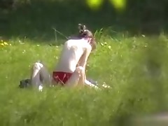 A creeper in the bushes catches a nude couple fucking in the park with his cam. Their nude bodies receive it on and enjoy their sex without a care in the world or the slightest suspicion that anybody may be lurking.