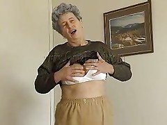 Sexy granny Rosa takes her raiment off and discloses that saggy tits of hers. That babe squeezes them for greater amount fun and lays down on the bed. The horny old lady widens her legs and fingers her love tunnel a little. That babe has a dildo and is ready to play with it. Wanna watch her sucking and sticking it in her pussy?